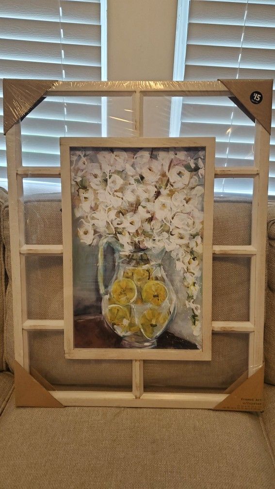 New artwork within window frame yellow flowers in Vase With lemon slices