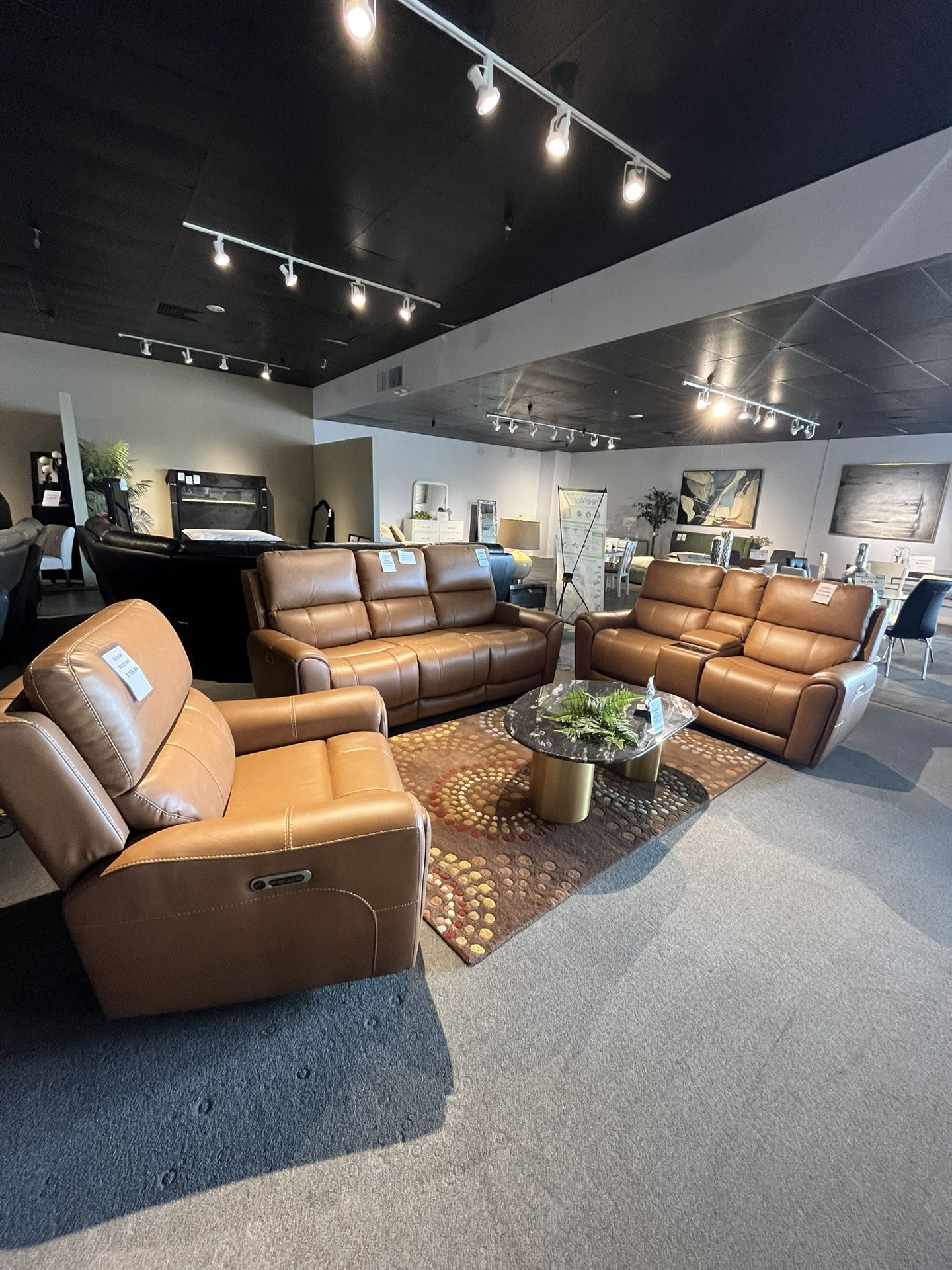 Brown Power Reclining Couch and loveseat