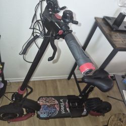 Varla eagle, one forty mile per hour, dual motor scooter
