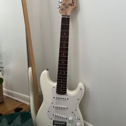 White Fender squier mini guitar