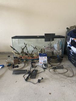 55 Gallon Fish Tank with all attachments and decorations and pebbles
