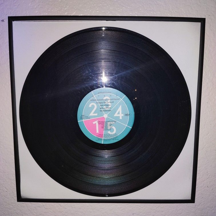 Vinyl Record  and Sleeve 