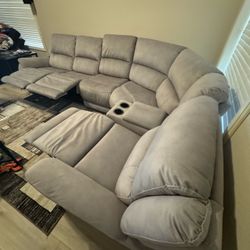 Reclining Sectional Sofa with Console and Recliner