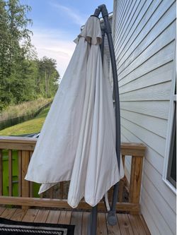 Tan outdoor umbrella