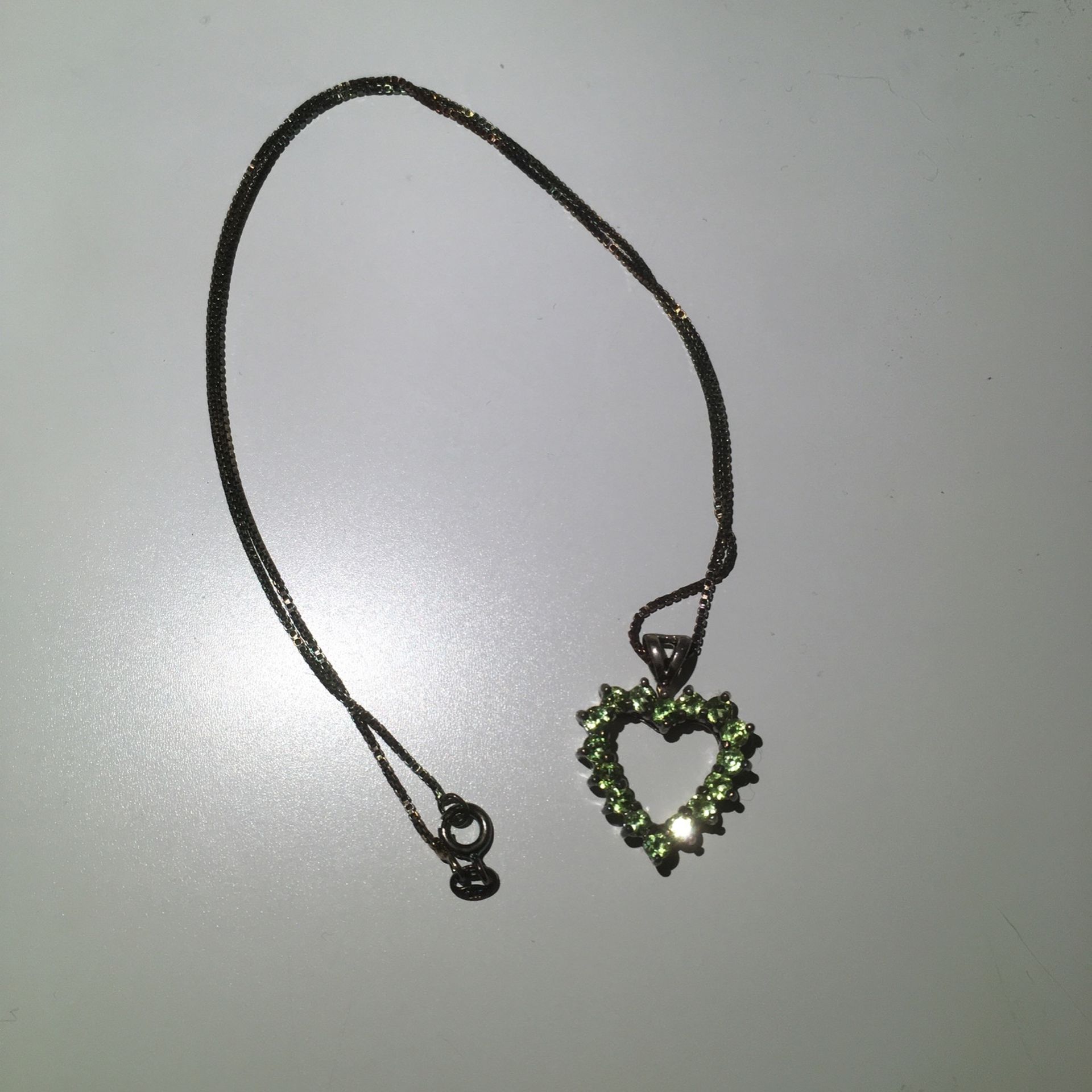 Heart Shaped Pendant With Green Stones