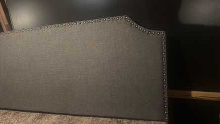 Gray Upholstered Headboard with Nailhead Trim