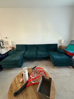 Dark teal/dark green couch