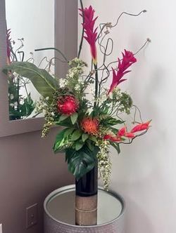 Tropical Floral Arrangement in Black Vase