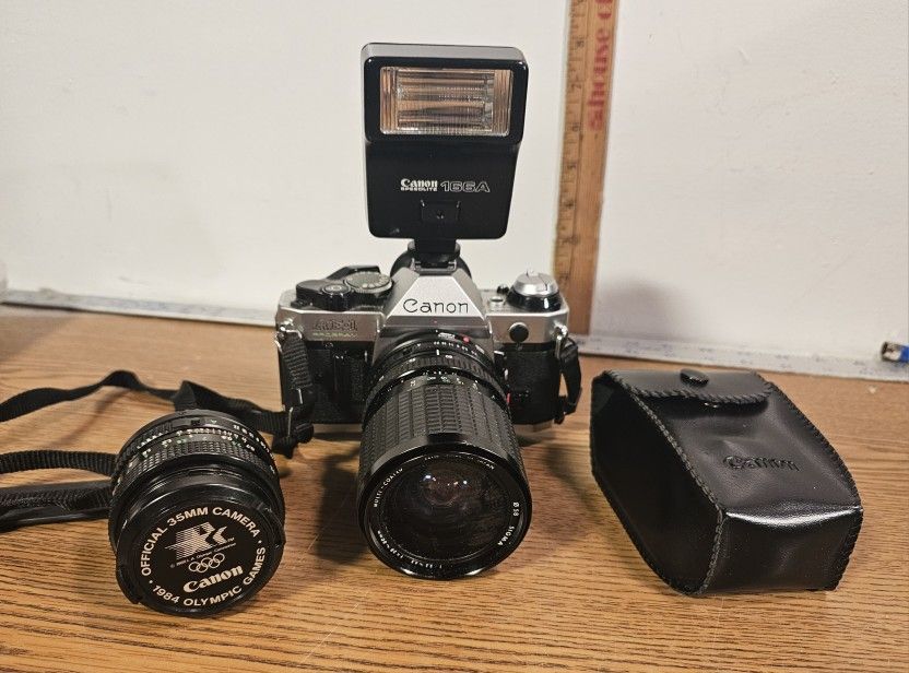 Canon AE-1 35mm Film Camera With 2 Lenses And Canon Flash READ. Watch Video Demo