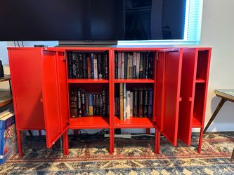 Red Shelves with Books
