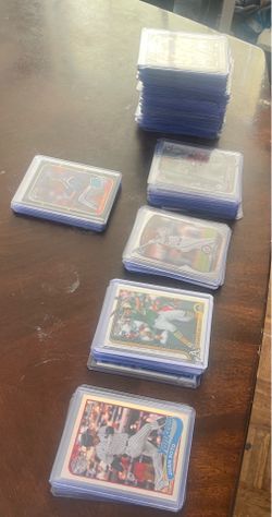 100 baseball cards in top loaders