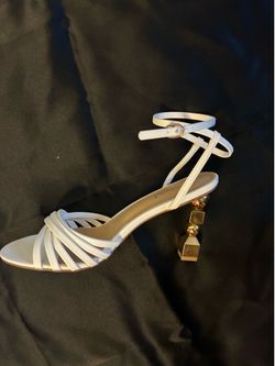 Size 10 white sandal with unique gold heel