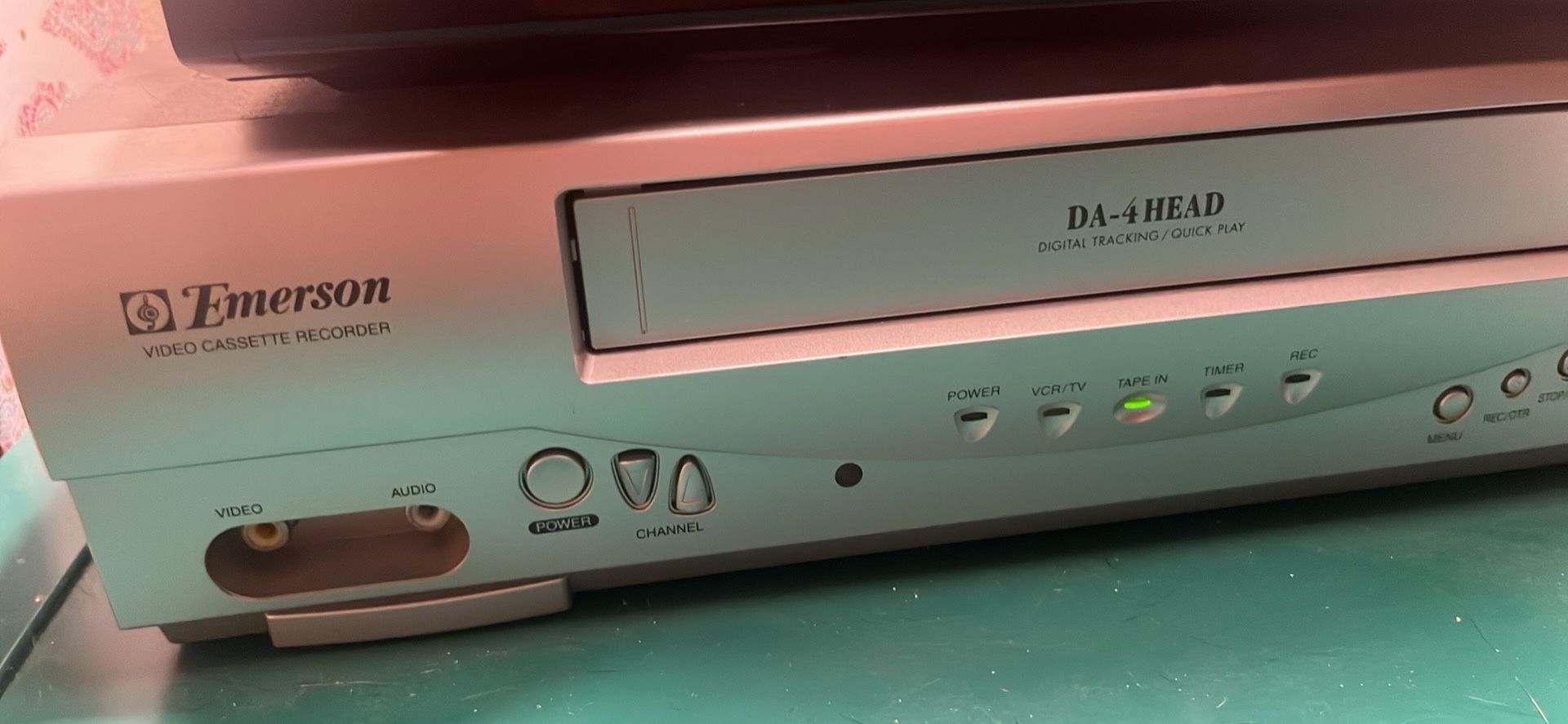 VHS PLUS DVD PLAYER AND TAPES