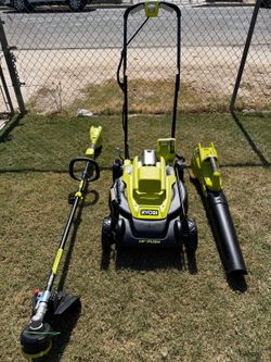 RYOBI 40V 3-piece kit: 18-inch push mower, leaf blower, string trimmer, 4Ah battery, and charger.