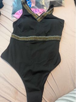 OQQ one piece bathing suit