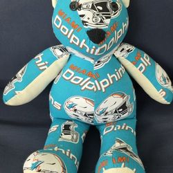 This is a Miami Dolphins custom 18-inch teddy bear.