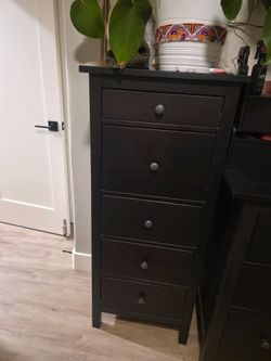 Tall black dresser