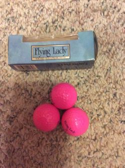 SPALDING FLYING LADY GOLF BALLS SET OF 3. The box doesn't look good, but the balls are new.