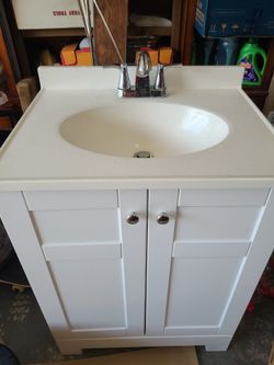 24" white vanity with sink top