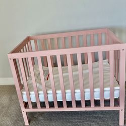Small pink crib