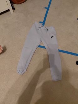Light blue Nike tech sweatpants