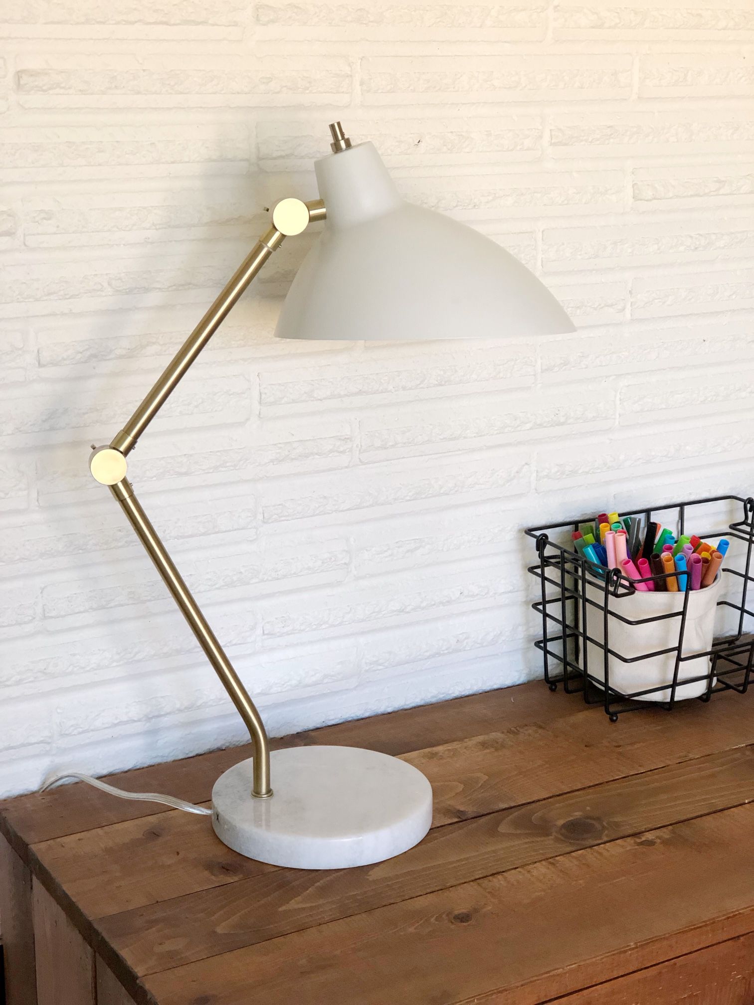 White modern task lamp with marble base and adjustable arm / apx. 22” tall