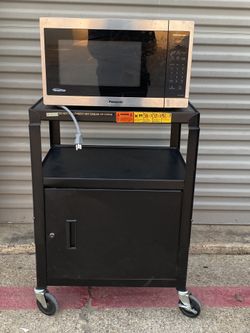 Black Rolling Cart Cart  Approx (34” H x 24” W x 18” D) With   Panasonic Inverter Microwave 1200 Watts - As Shown  