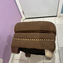 Brown futon. Length: 28 inches.  Wide: 22 inches. Height: 16 inches 