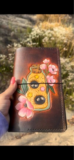 Handtooled leather travelers notebook standard size with soot sprites and cherry blossoms