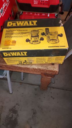 DEWALT
 12 Amp Corded 2-1/4
Horsepower Fixed and Plunge
Base Router Kit
