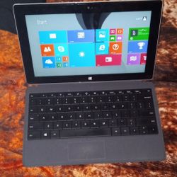 ( Touchscreen ) Microsoft surface 

Windows 8.1 

Webcam 

32bit system 

2gb ram 

32gb SSD