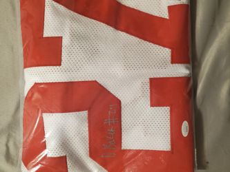 Autographed jerseys and photos