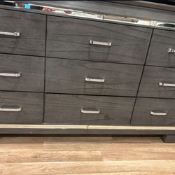 Grey dresser with mirror accents 