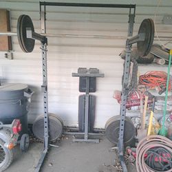 Squat Rack With 230 Pounds Bumper Plate With Bench And Bar. 