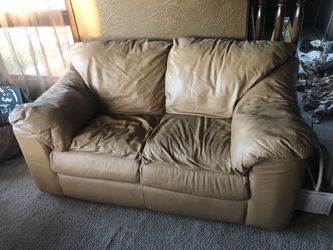 Leather loveseat with matching large foot stool