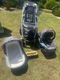 UPPAbabyVista stroller system with meds car seat, bassinet, and piggyback board