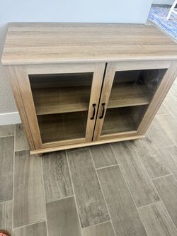 Light Wood Cabinet with Glass Doors