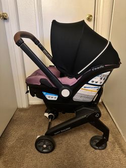 Pink Evenflo shyft dualride infant car seat and stroller