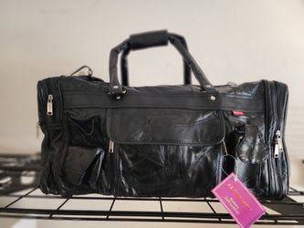 Duffle Bag, Travel, Sports, Gym Bag. New with tags.
Never used.
Patch Leather.