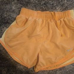 Nike orange running shorts Size S