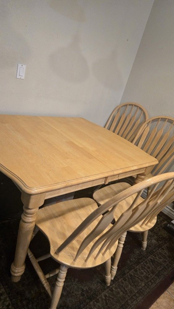 Light Wood Dining Table (52" x 42") with 4 Chairs - Perfect for a Cozy Space!