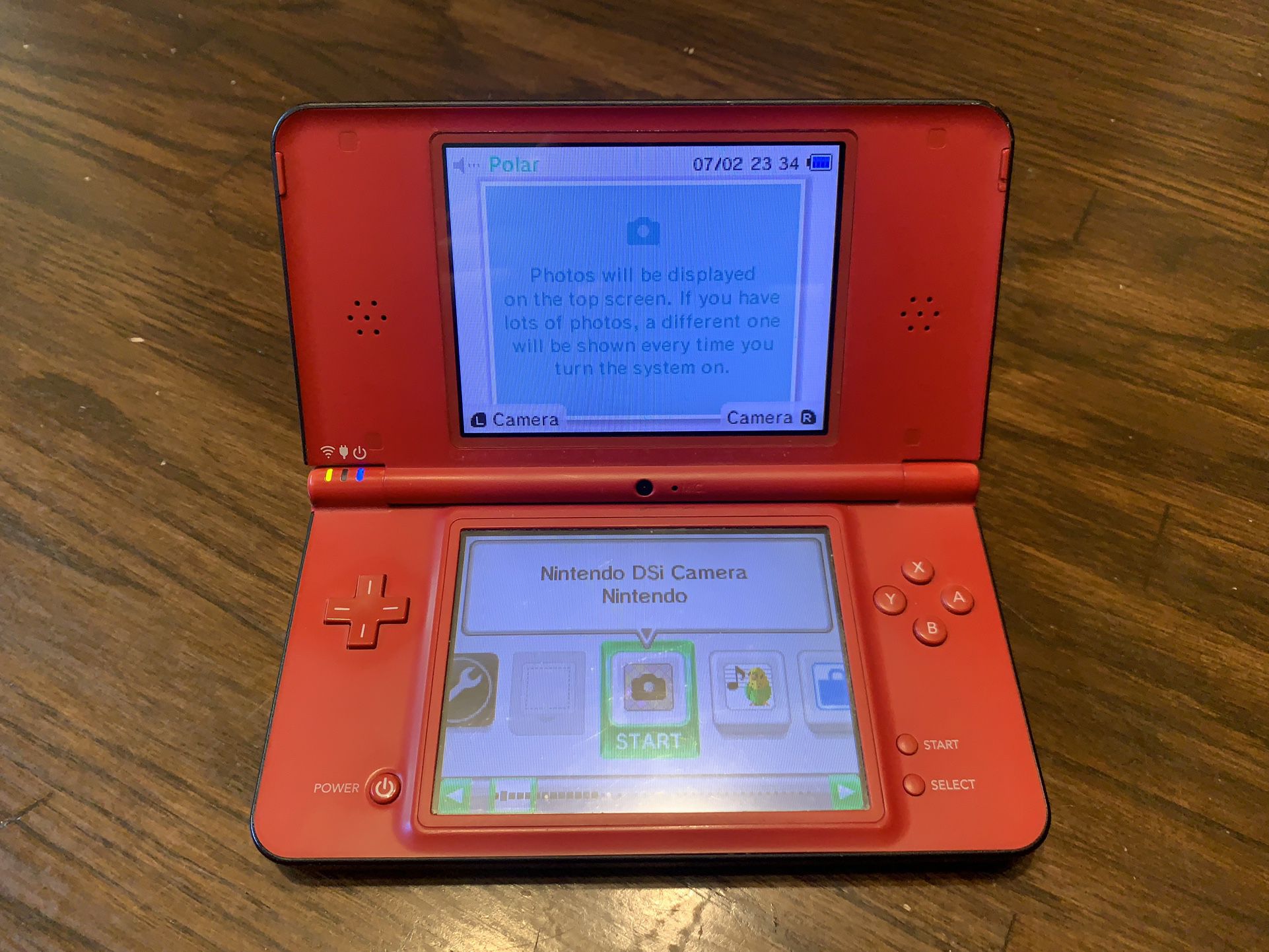 Nintendo DSi Orange handheld system Console