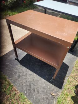 Metal table cart on wheels