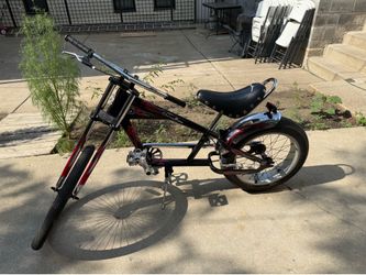 Schwinn Stingray Orange County Choppers bike in black with a red flame design