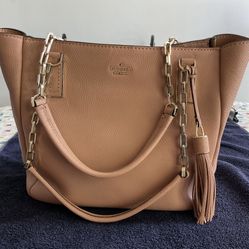Kate Spade Tan Pebble Leather Zippered Tote With Tassel Charm