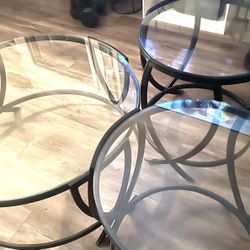 Gray couches and black end tables