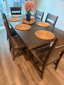 Dark brown dining table