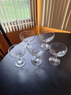 5 clear coupe glasses