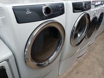 Electrolux front load washer and dryer set on pedestals - Free delivery