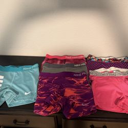6 Pairs Of Nike Pro Shorts (Size small) 
